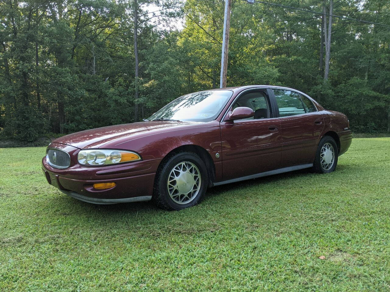2001 Buick Lesabre parked under a tree